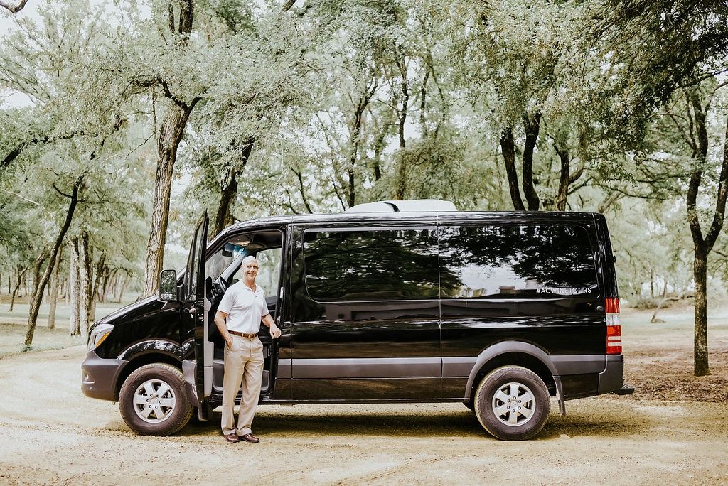 The Absolute Charm Mercedes Sprinter van parked at a winery