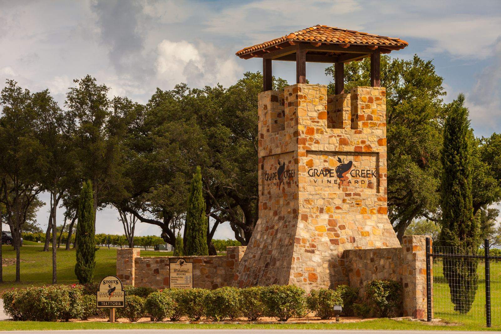 The stone tower at the entrance to Grape Creek Vineyards on Highway 290